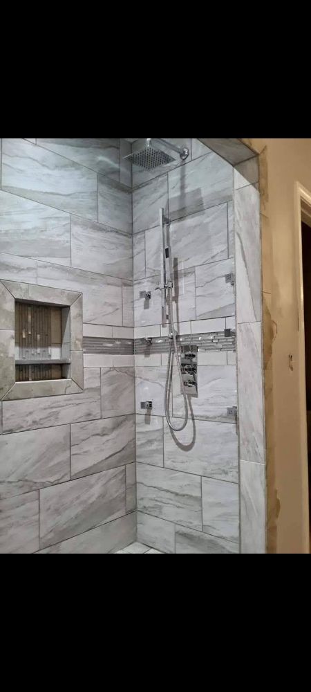 Slide of Bathmatic Custom Tile and Shower