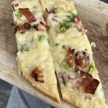 Bistro On Eden - Maine Mash flatbread pizza (partially eaten) - New American Near Me - Bar Harbor, Maine Bistro On Eden - Maine Mash flatbread pizza (partially eaten) - New American Near Me - Bar Harbor, Maine