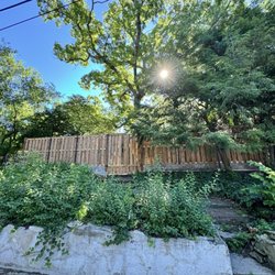 Century Lawn Care Co - View from alley, retaining wall