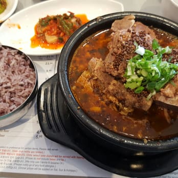 Cho Sun Ok - Gamjatang with purple rice, photo bombed by kimchi. - Korean Near Me - Thornhill, Ontario Cho Sun Ok - Gamjatang with purple rice, photo bombed by kimchi. - Korean Near Me - Thornhill, Ontario
