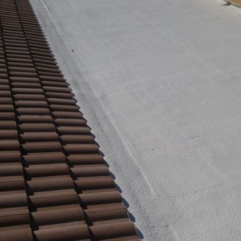 Harper's Roofing - Maintenance white coat - Roofing Near Me