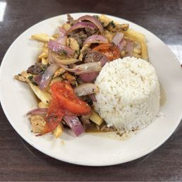 Lomo Saltado with beef and chicken