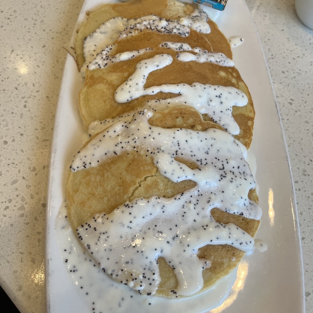 Eggsquisite Cafe - Lemon poppy pancakes. Tough as stale bread! - Breakfast & Brunch Near Me - Frisco, Texas
