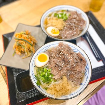 Sanuki Udon - two bowls of food on a table - Japanese Near Me - Toronto, Ontario Sanuki Udon - two bowls of food on a table - Japanese Near Me - Toronto, Ontario