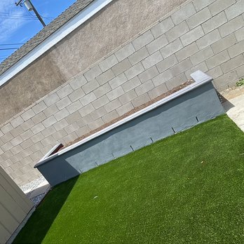 Edgar Landscaping - In this photo, we built a concrete-block dish rack finished with stucco and decorative caps. - Tree Services Near Me - Wilmington, California Edgar Landscaping - In this photo, we built a concrete-block dish rack finished with stucco and decorative caps. - Tree Services Near Me - Wilmington, California