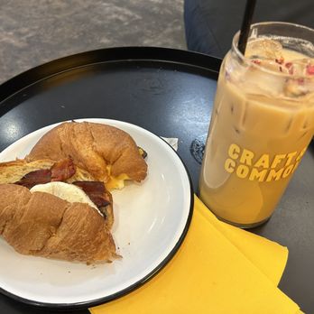 Craft & Common - Bacon croissant and while child iced latte - Coffee & Tea Near Me - Orlando, Florida Craft & Common - Bacon croissant and while child iced latte - Coffee & Tea Near Me - Orlando, Florida