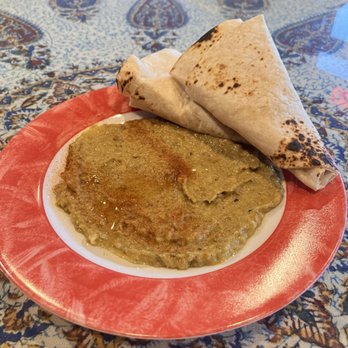 Ahmad's Persian Cuisine - Baba goo nooj served with 1 flour tortilla - Middle Eastern Near Me - Omaha, Nebraska Ahmad's Persian Cuisine - Baba goo nooj served with 1 flour tortilla - Middle Eastern Near Me - Omaha, Nebraska