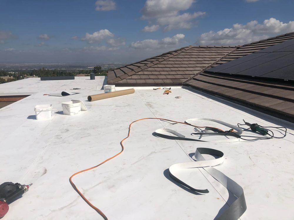 Slide of Santiagos Roofing