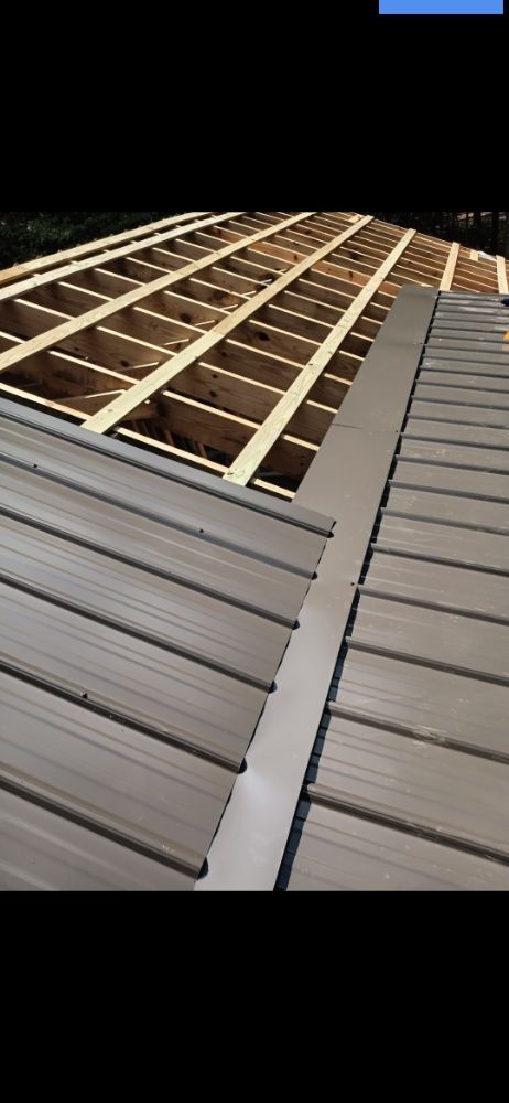 Slide of Mike's roofing and repairs