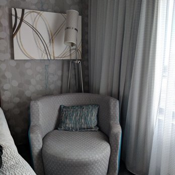 Courtyard by Marriott Miami at Dolphin Mall - A small armchair nook by the window - Hotels Near Me - Miami, Florida