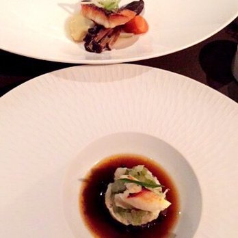 La Toque - dungeness crab w/ dirty rice (front) and black bass (back) - French Near Me - Napa, California La Toque - dungeness crab w/ dirty rice (front) and black bass (back) - French Near Me - Napa, California