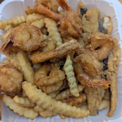 Si Fish & More - Fried catfish and shrimp with fries.