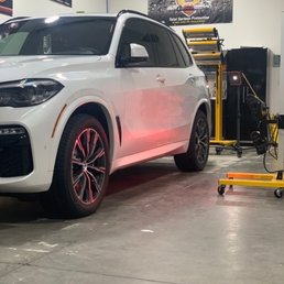 2029 BMX X5 being ceramic coated by the professionals.  The curing process is important.