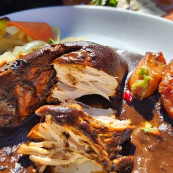 Elvira's - Mole Negro, half eaten Notice the pickled vegetables which should be left in a kitchen. - Mexican Near Me - Tubac, Arizona Elvira's - Mole Negro, half eaten Notice the pickled vegetables which should be left in a kitchen. - Mexican Near Me - Tubac, Arizona