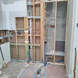 Alpha & Omega Electric Contractor - Moved the electric from L to R for refrig, and moved electric for outlets upwards for undermount lighting.