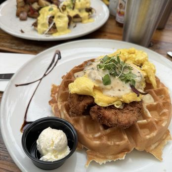 Sunny Side Solana - Chicken and Waffles with egg and gravy. Make sure you get the warm syrup. - Breakfast & Brunch Near Me - Solana Beach, California Sunny Side Solana - Chicken and Waffles with egg and gravy. Make sure you get the warm syrup. - Breakfast & Brunch Near Me - Solana Beach, California
