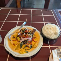 Gang dang braised duck - duck leg in a bold red curry, balanced with sweet and tangy notes of orange, tomato, and walnut. Gang dang braised duck - duck leg in a bold red curry, balanced with sweet and tangy notes of orange, tomato, and walnut.