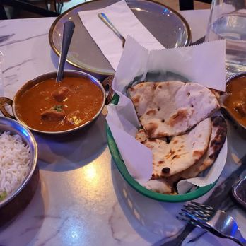 Namaste Miami - Butter Chicken and Mango Curry Chicken with Rice and Garlic Naan - Indian Near Me - Miami, Florida