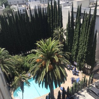 Fontenoy Apts - View of the pool area from the living room - Apartments Near Me - Los Angeles, California Fontenoy Apts - View of the pool area from the living room - Apartments Near Me - Los Angeles, California