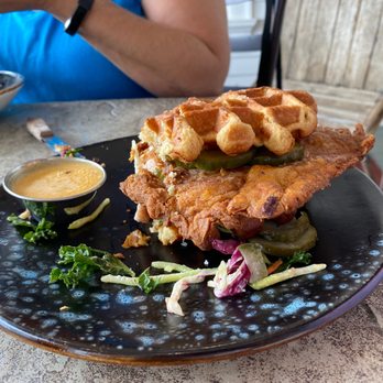 Brunch & - Wendy, Darling - a fried chicken sandwich with pickles and slaw, between two waffles. - Breakfast & Brunch Near Me - Estes Park, Colorado