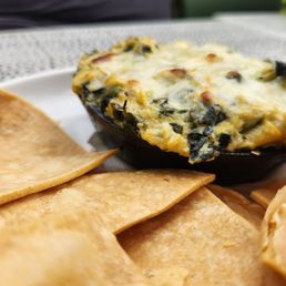 Spinach artichoke dip, lots of artichoke hearts, sturdy chips Spinach artichoke dip, lots of artichoke hearts, sturdy chips