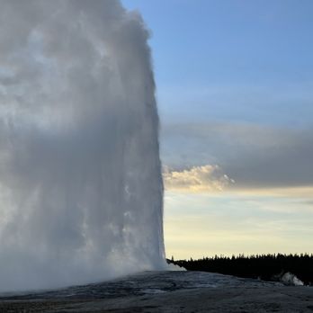 Old Faithful - Observation Point - Old faithful erupting at sunset - Hiking Near Me - Old Faithful, Wyoming