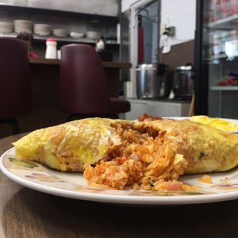 Waipahu Cafe - Kim chee omelette cross-section - Diners Near Me - Waipahu, Hawaii Waipahu Cafe - Kim chee omelette cross-section - Diners Near Me - Waipahu, Hawaii
