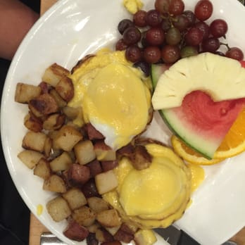 Yolk - South Loop - Benedict with diced red potatoes and fresh fruit - Breakfast & Brunch Near Me - Chicago, Illinois Yolk - South Loop - Benedict with diced red potatoes and fresh fruit - Breakfast & Brunch Near Me - Chicago, Illinois