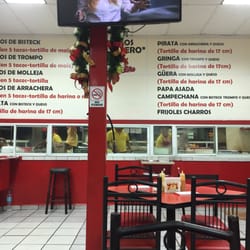 Tacos el Güero - Menú en pared