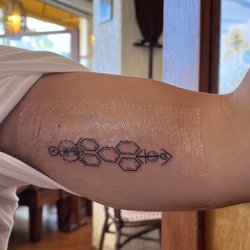 Blue Wave Tattoo Kauai - Family tribal tattoo
