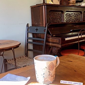 Shady Grove Lukaya Cafe - a cup of coffee and pastries on a table - Coffee & Tea Near Me - Hamilton, Ontario Shady Grove Lukaya Cafe - a cup of coffee and pastries on a table - Coffee & Tea Near Me - Hamilton, Ontario