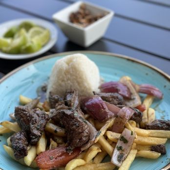 Victoria's Pisco Lounge - Fries, steak, red onion and rice !!! Melt in your mouth good ! - Peruvian Near Me - Lake Worth, Florida Victoria's Pisco Lounge - Fries, steak, red onion and rice !!! Melt in your mouth good ! - Peruvian Near Me - Lake Worth, Florida