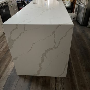 Remodeling Plus - Kitchen island with waterfall countertops - Countertop Installation Near Me - Riverside, California