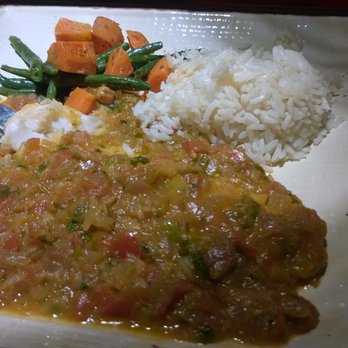 Mayan Kitchen - Grilled red snapper covered with zesty veggie sauce - Latin American Near Me - Chattanooga, Tennessee