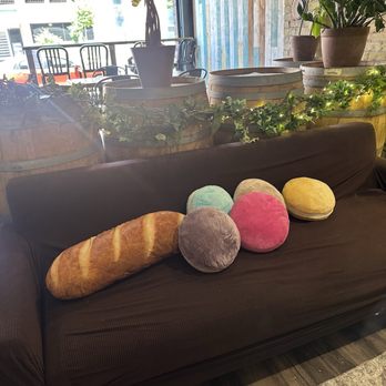 Duluth’s Best bread - Couch w baguette and macaron pillows - Bakeries Near Me - Duluth, Minnesota Duluth’s Best bread - Couch w baguette and macaron pillows - Bakeries Near Me - Duluth, Minnesota
