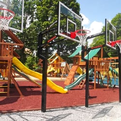 Best In Backyards - These Best in Backyards' displays feature Goalsetter basketball systems, Eastern Jungle Gym cedar swing sets and rubber playground mulch.