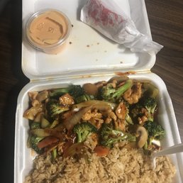 a meal in a styrofoam container