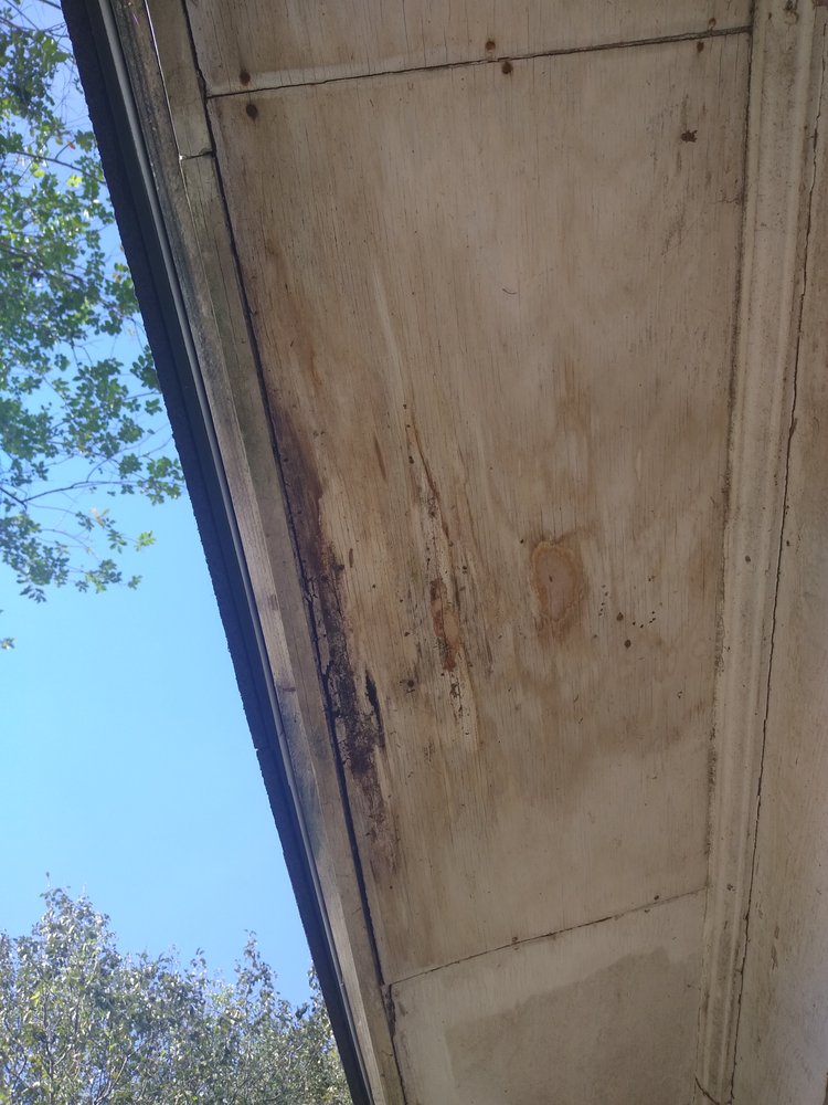 Slide of Tadlock Roofing