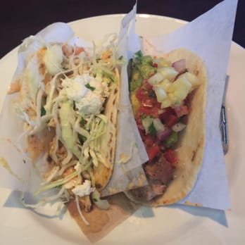 Yard House - Chicken tinga on the left and carnitas on the right - New American Near Me - Indianapolis, Indiana Yard House - Chicken tinga on the left and carnitas on the right - New American Near Me - Indianapolis, Indiana