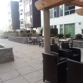 525 At The Enclave by Pinnacle - Outdoor courtyard. - Apartments Near Me - Seattle, Washington 525 At The Enclave by Pinnacle - Outdoor courtyard. - Apartments Near Me - Seattle, Washington