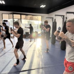 Assembly Line Muay Thai - Muay Thai class is in session