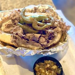 Italian beef, dipped with sweet peppers and hot giardiniera. Italian beef, dipped with sweet peppers and hot giardiniera.