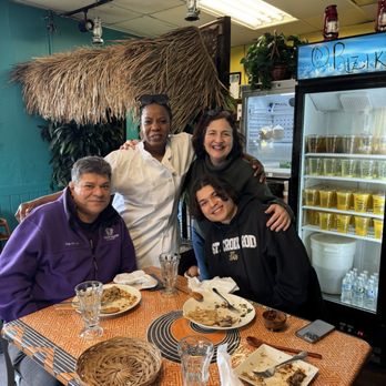 Riziki Swahili Grill - Owner Raziki Yussuf and my family at her restaurant - African Near Me - Columbus, Ohio Riziki Swahili Grill - Owner Raziki Yussuf and my family at her restaurant - African Near Me - Columbus, Ohio