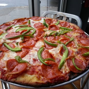 Sizzle Pie - Gluten free regular with pepperoni and green peppers - Pizza Near Me - Portland, Oregon Sizzle Pie - Gluten free regular with pepperoni and green peppers - Pizza Near Me - Portland, Oregon