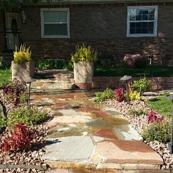 Evergreen Landscaping Services - Rock job planting