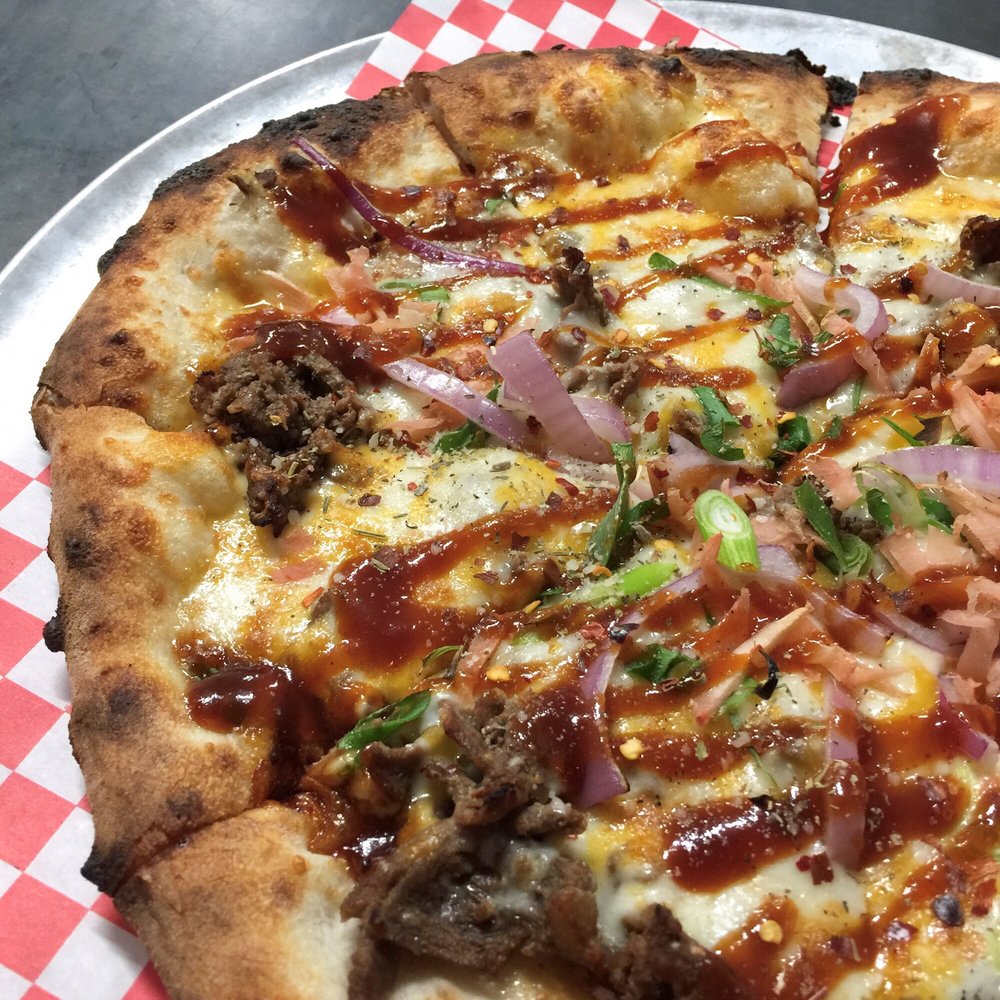Boxcar Bar + Arcade - Korean BBQ pizza with ginger, red onions, and marinated beef - Bars Near Me - Durham, North Carolina Boxcar Bar + Arcade - Korean BBQ pizza with ginger, red onions, and marinated beef - Bars Near Me - Durham, North Carolina
