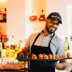 Chef to go - Chef Carlos Guzman serving canapés