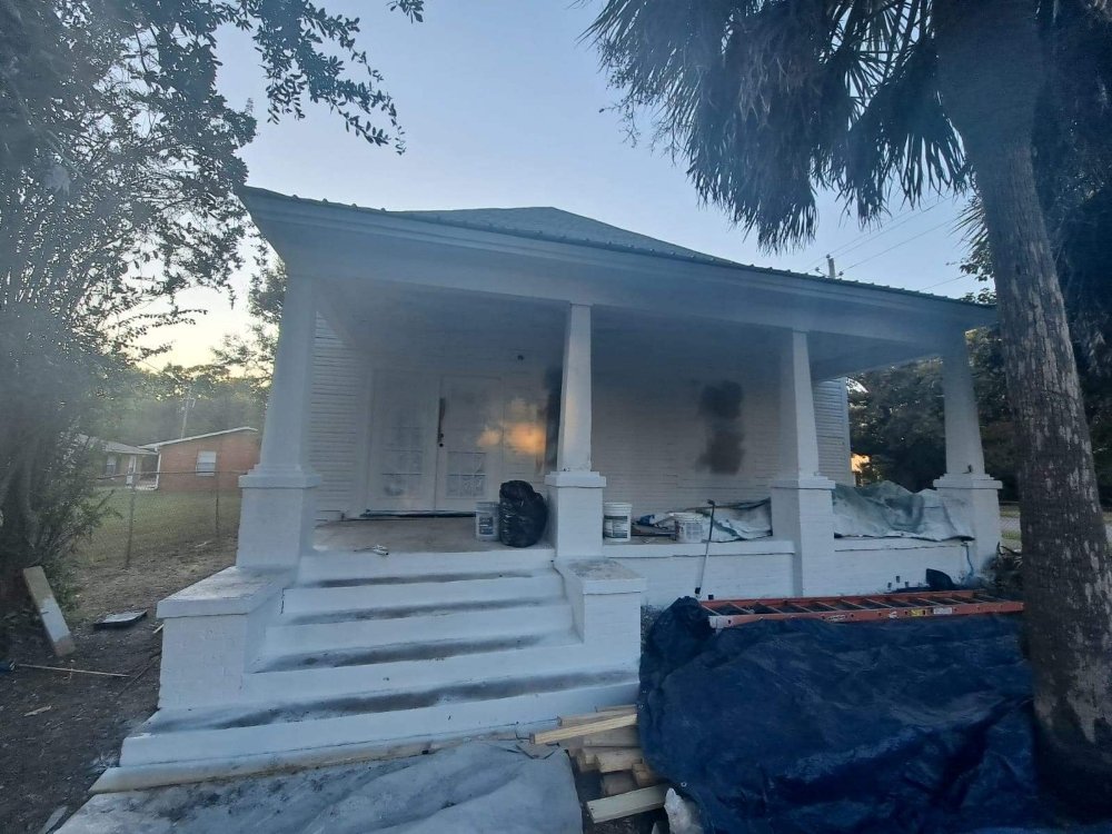 Slide of Hunter's Roofing & Construction