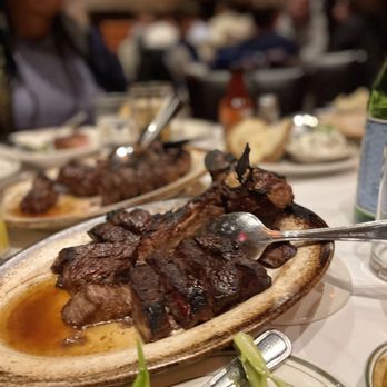 Rocco Steakhouse - a plate of steak and broccoli - American Near Me - New York, New York Rocco Steakhouse - a plate of steak and broccoli - American Near Me - New York, New York