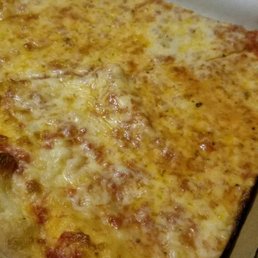 a slice of cheese pizza in a box a slice of cheese pizza in a box